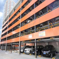 Sistema de estacionamiento para automóviles de elevación y recorrido de seis capas