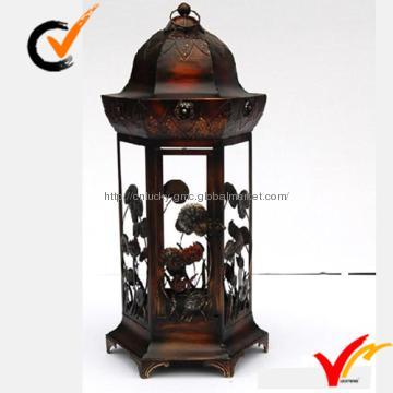 Rustic metal lantern with flower decoration