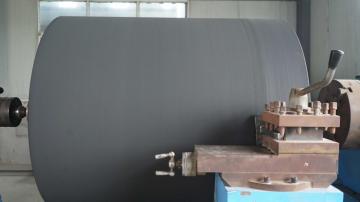 Production of rubber rollers for machinery