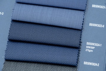 Blauwe effen stof van 50% wol