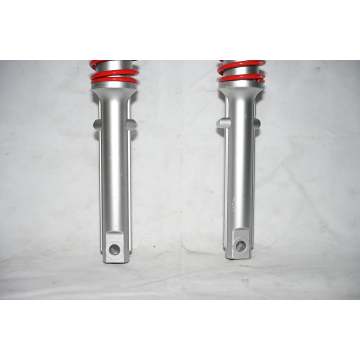 Amortiguador de resorte externo para triciclo eléctrico