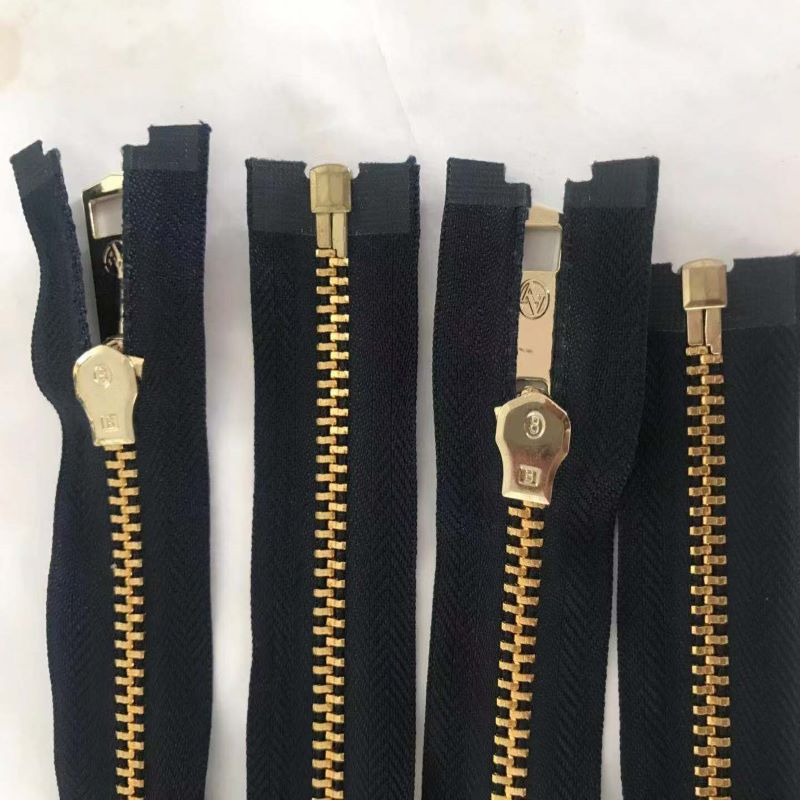 Continuous unique golden metal zippers for coat