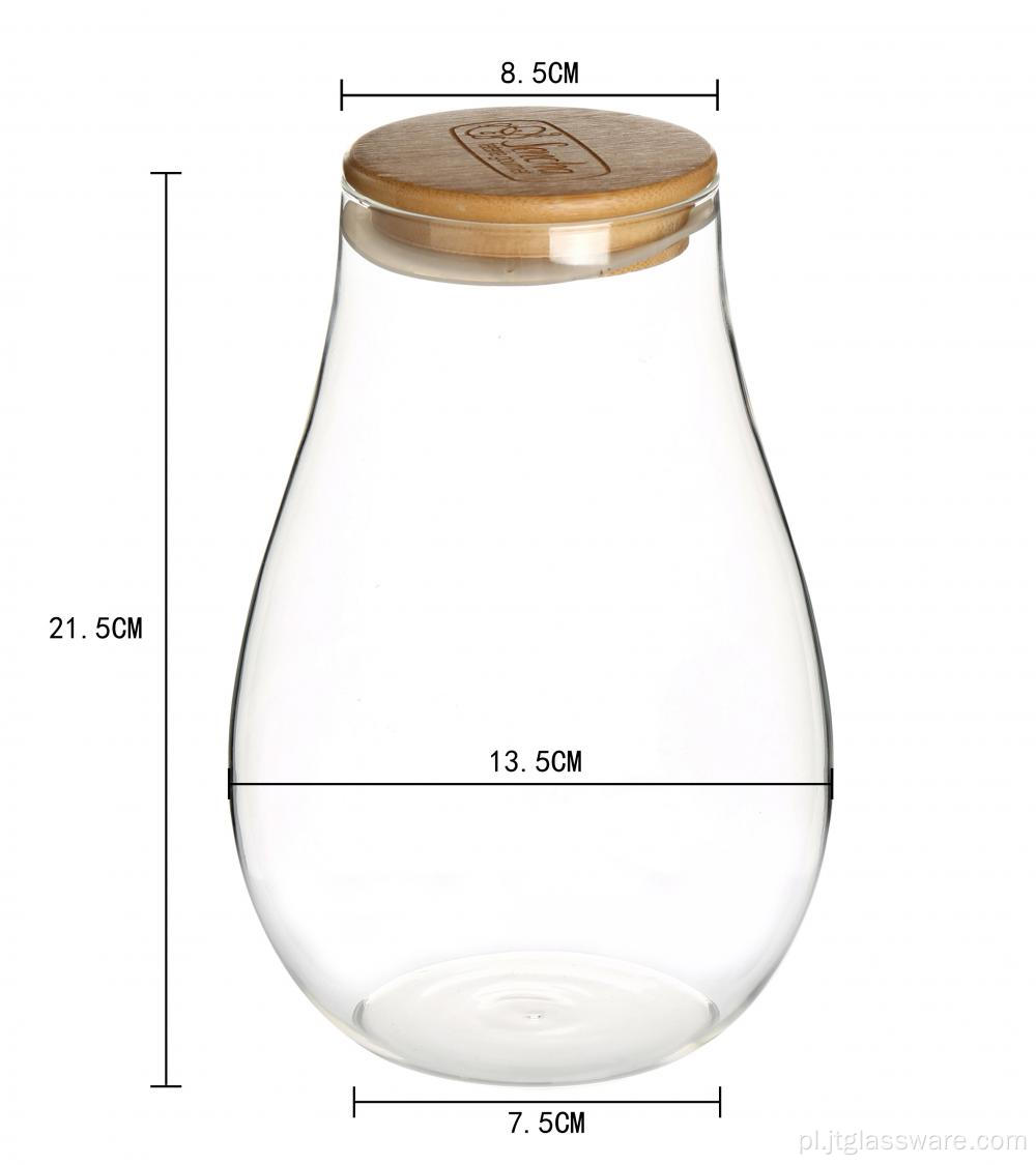 Słoiki z przezroczystego szkła z pokrywką z drewna