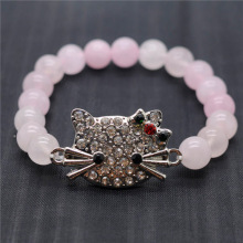 Bracelet de pierres précieuses extensibles de perles rondes de quartz rose 8MM avec pièce de tête de chat en alliage Diamante