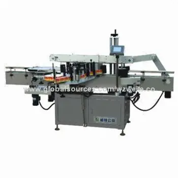 Label sleeving and shrinking machine