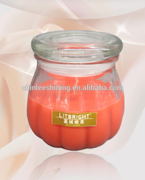 candles in glass cup
