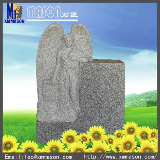 White angel cemetery monument