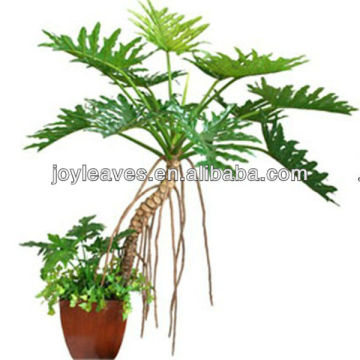 Artificial green philodendron tree