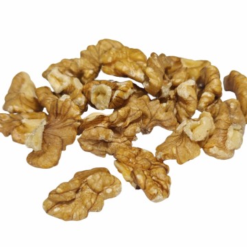 Ingredientes econômicos, grãos de noz, tamanho de um quarto