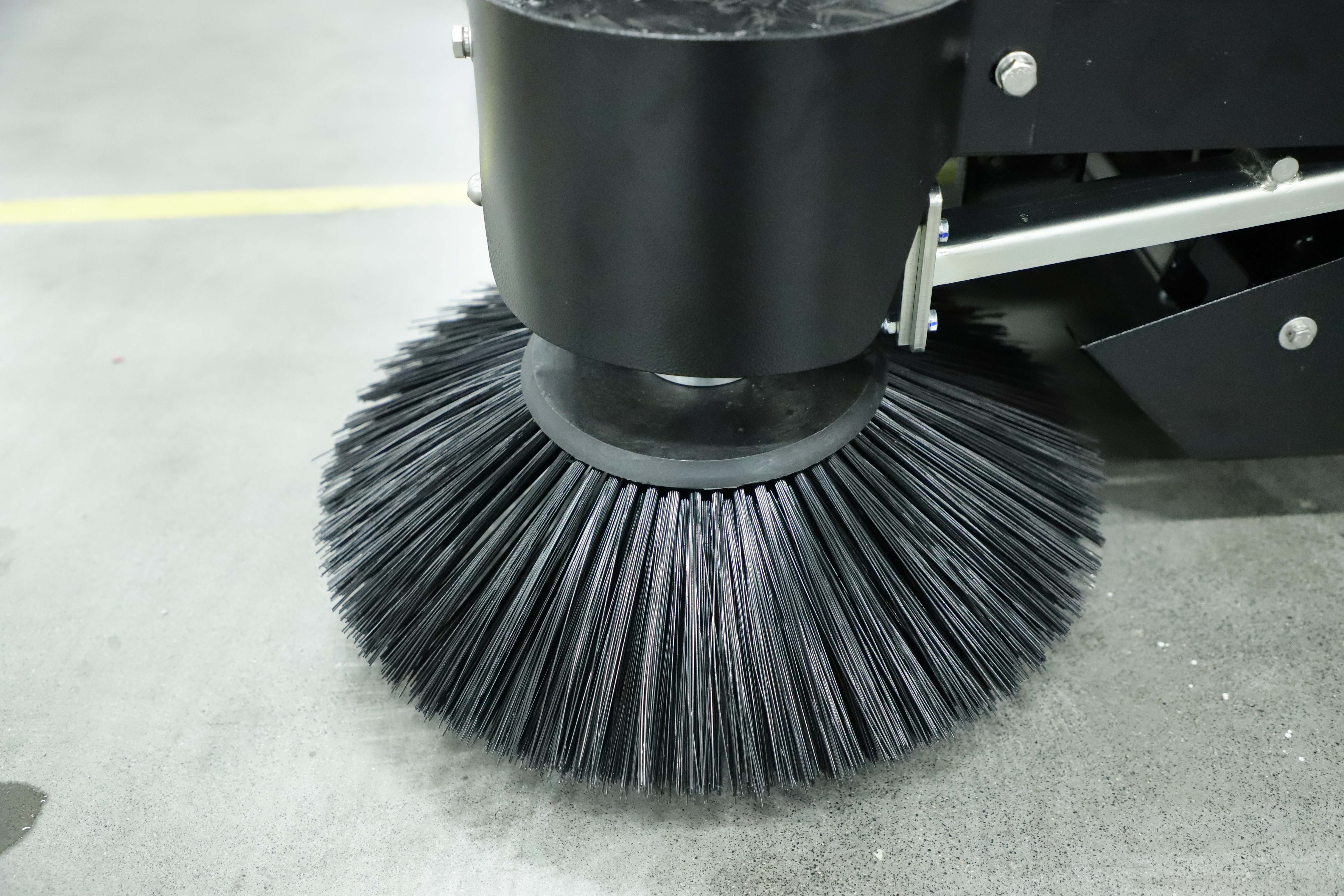 Ride-on floor sweeper