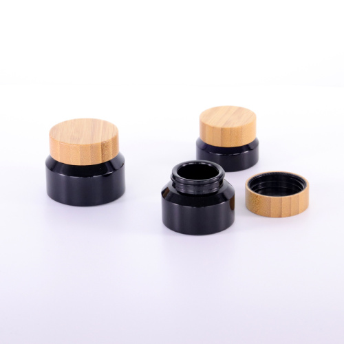 Black oblique shoulder cream jar with bamboo lid