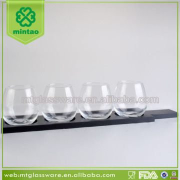 Clear stemless wine glass beer cup with black wooden rack and plate                        
                                                Quality Choice