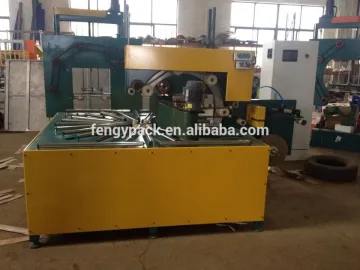 Horizontal coil wrapping machine
