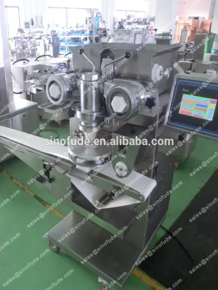 Moon cake encrusting and filling machine