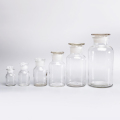 Botella de reactivo de laboratorio transparente ámbar