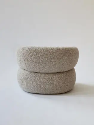 Moving Mountains Puffer chair by boucle fabric