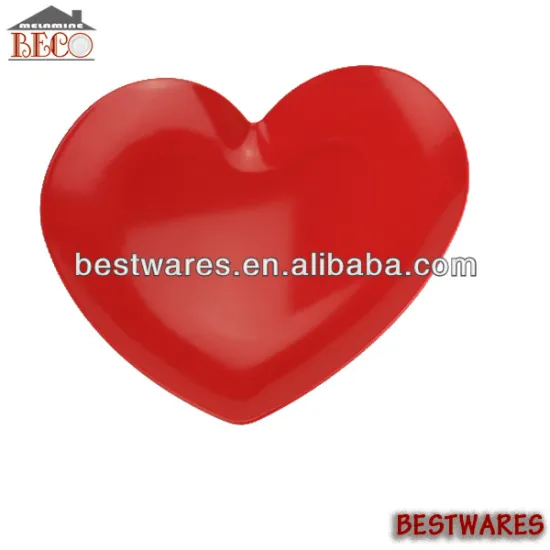Red plastic heart shaped plate