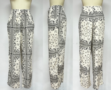 PRINTED TROUSERS WITH AN ELASTICATED WAISTBAND