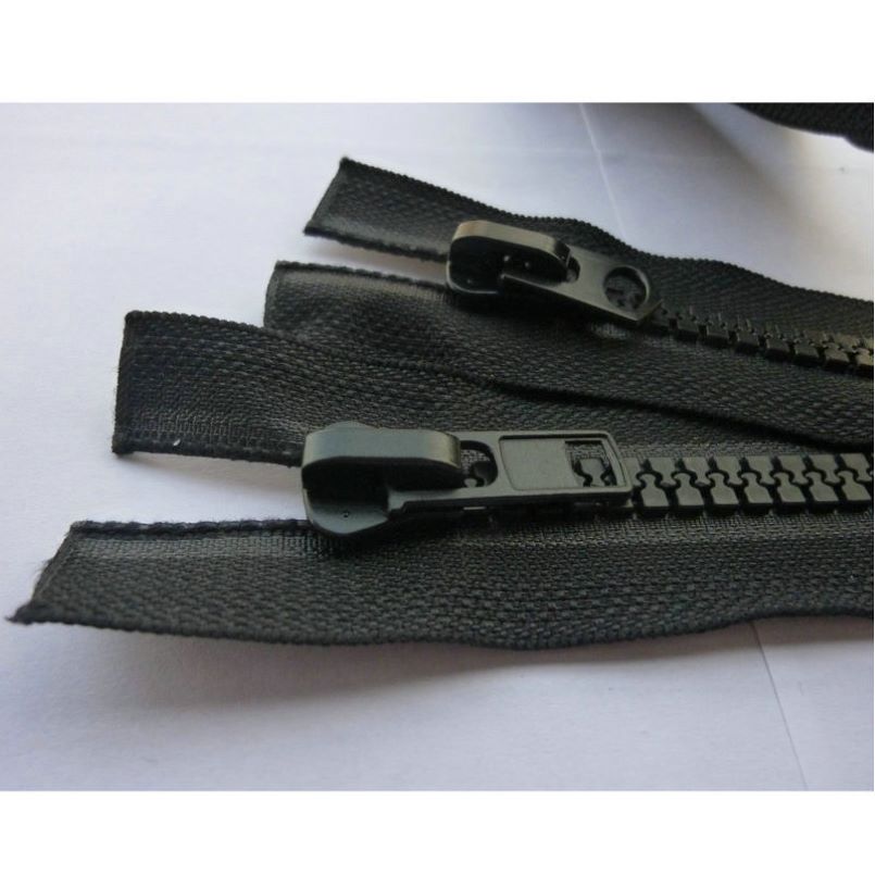 Adhesive polyester zipper