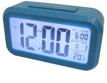 Capteur de lumière rétro-éclairage bleu Corloge de table d'alarme - batterie portable en fonctionnement