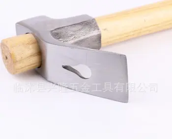 Adze with wooden handle