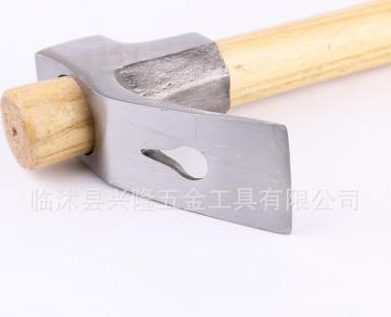 Adze with wooden handle
