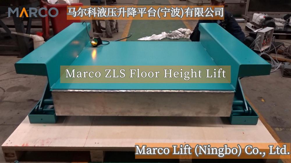 Hydraulic floor lift table