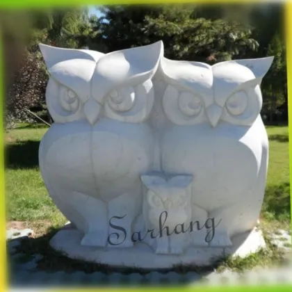 White stone owl garden statues