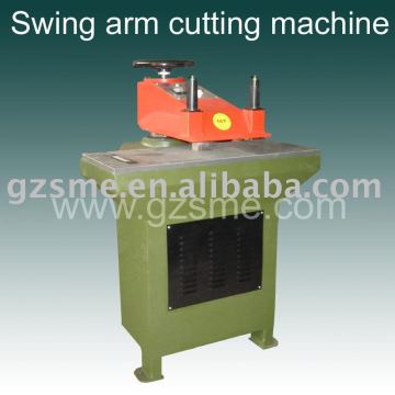 Swing arm cutting machine