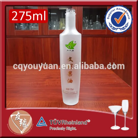 white frosted surface handling custom shaped alcohol 275ml glass bottle