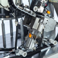 Machine de montage de curseur à glissière en nylon