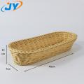 oval shaped brown rattan basket for fruit display