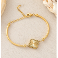 Brazalete de titanio de trébol de oro de mujeres para mujeres