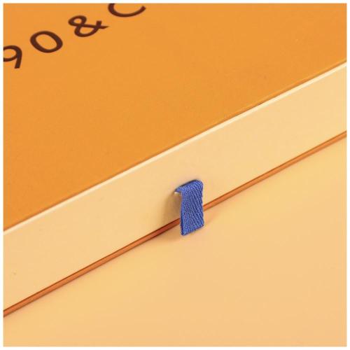 Caixa de gaveta de papel de textura laranja com logotipo UV
