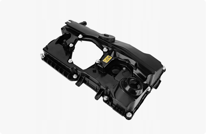 Reinforced plastic composite valve cover