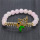 Bracelet de pierres précieuses extensibles avec perles rondes de quartz rose 8MM avec morceau de papillon Diamante