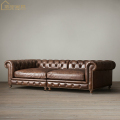 tuftowana sofa narożna w stylu amerykańskim w stylu Chesterfield