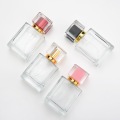 Elegantes botellas de aerosol de vidrio de lujo con tapa acrílica