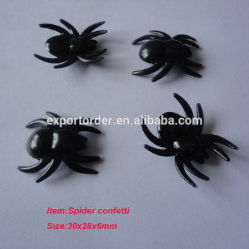plastic black spider as halloween confetti