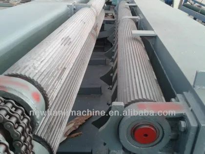 Hydraulic wood rounding debarker