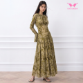 Fließendes gelbgrünes Maxikleid mit Blumenmuster