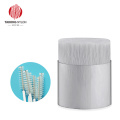 Wetrans-PBT filament material for mascara brush