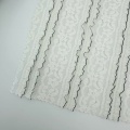 Dehnbarer gestrickter Spitzenstoff mit Blumenstreifen