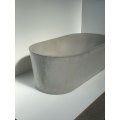 Moderne matte ovale Betonbadewanne