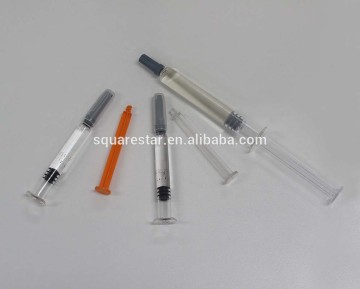 Automatic syringe assembly and labeling machine