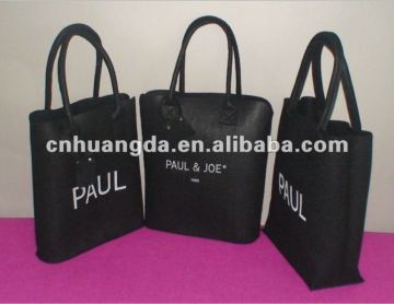 Black felt bag with whit logo