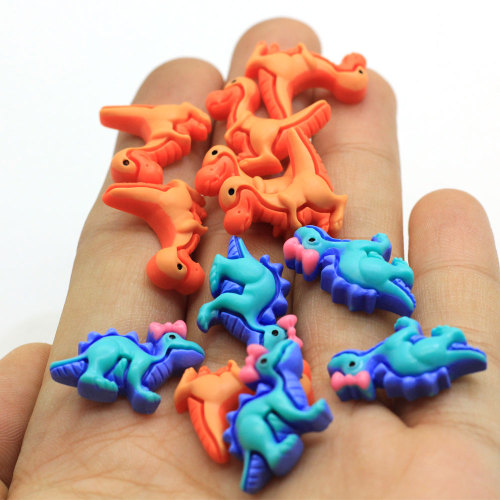 100 unids / lote Kawaii Cabujones de dinosaurio de resina Flatback Dino Cabs para el centro del arco del pelo Adorno DIY Accesorios para teléfono