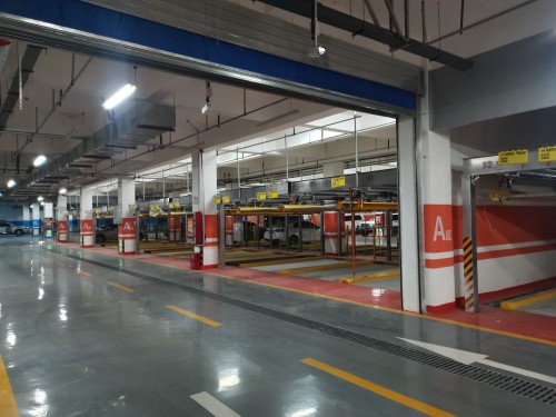 Two layer puzzle parking system of pit type