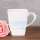 caneca de café quadrada rosa com colher rosa