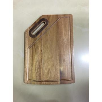 wooden cutting board with juice groove